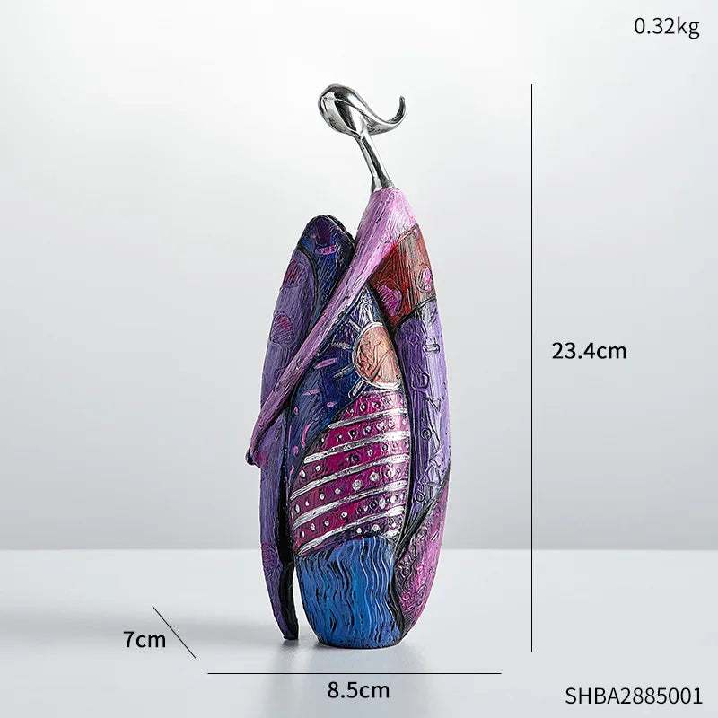 Nordic Style Abstract resin figurine with a glossy purple, pink, blue and magenta geometric design and silver loop top.