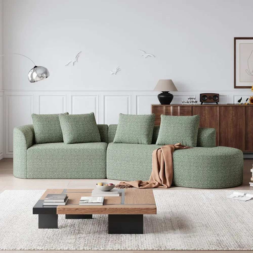 Chenille Sectional Sofa in sage green textured upholstery, with a curved chaise, deep seats and four matching pillows