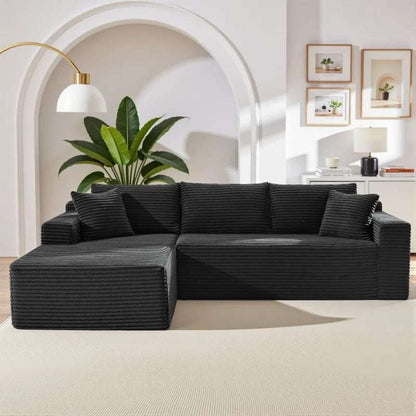 Corduroy L-Shaped Sectional in black ribbed upholstery with a deep seat, chaise lounge, and wide cushioned back