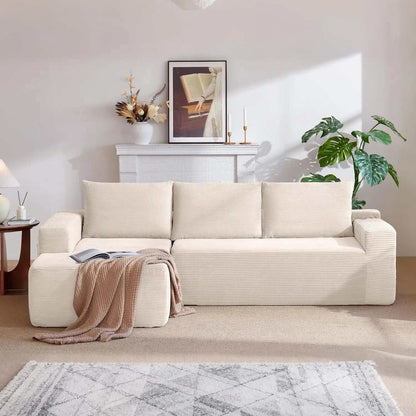 Corduroy L-Shaped Sectional in ivory ribbed upholstery with deep seat, broad cushions, and a chaise lounge