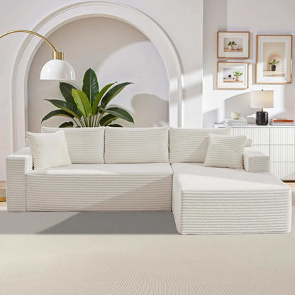 Corduroy L-Shaped Sectional in ivory ribbed upholstery with deep seats, broad chaise, and clean modern lines