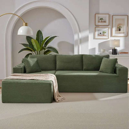 Corduroy L-Shaped Sectional in dark olive green ribbed upholstery, with a chaise lounge and deep seat