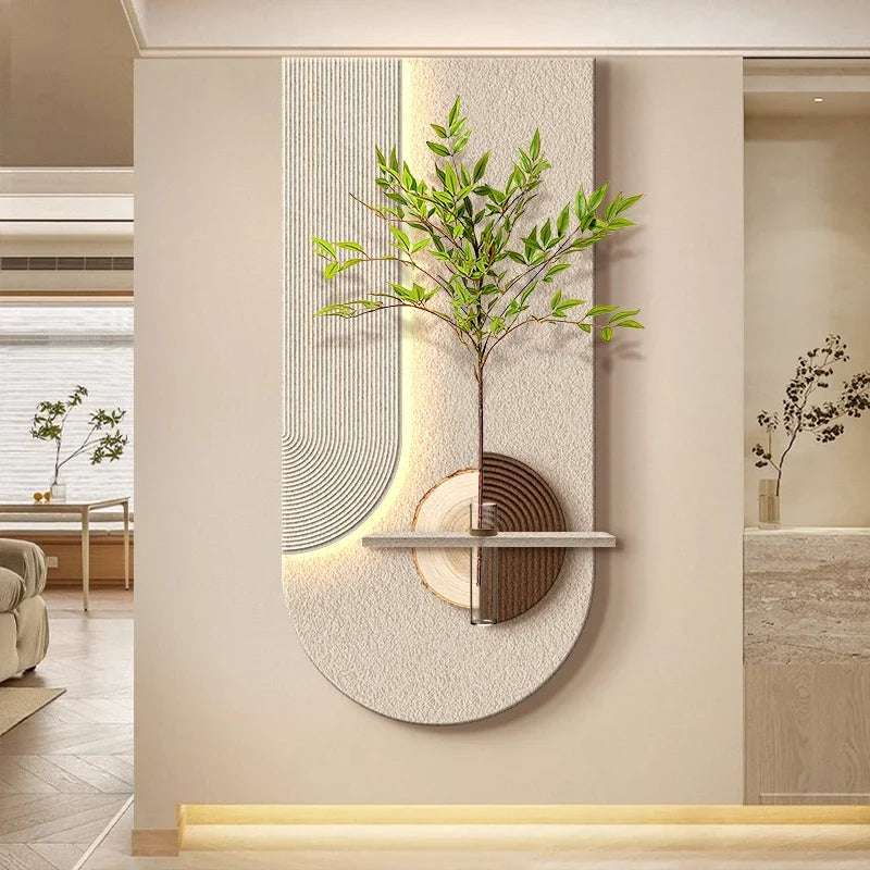 Entrance LED Wall Lamp with a textured cream semicircular wall panel, wood-toned accents, glowing light and green leafy branches.
