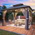 Gazebo Hardtop Aluminum Frame with a dark gray metal frame, ridged double-tier roof, curtains, and string lights