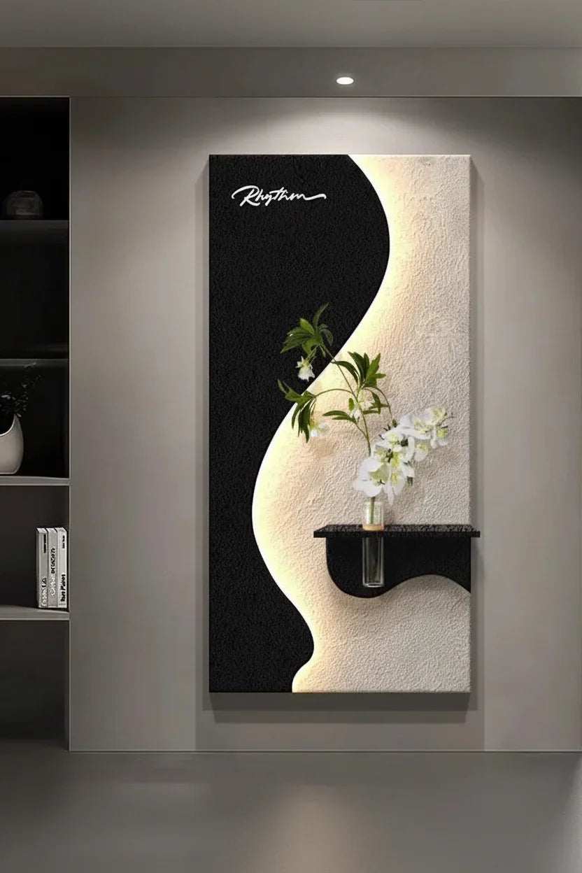 Green Plant LED Wall Lamp featuring a black-and-white wavy panel, with green foliage and white flowers on a small shelf