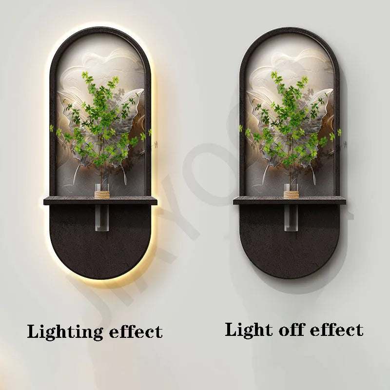 Green Plant Wall Lamp with a black arched frame, clear panel, and green foliage motif, shown lit and unlit.