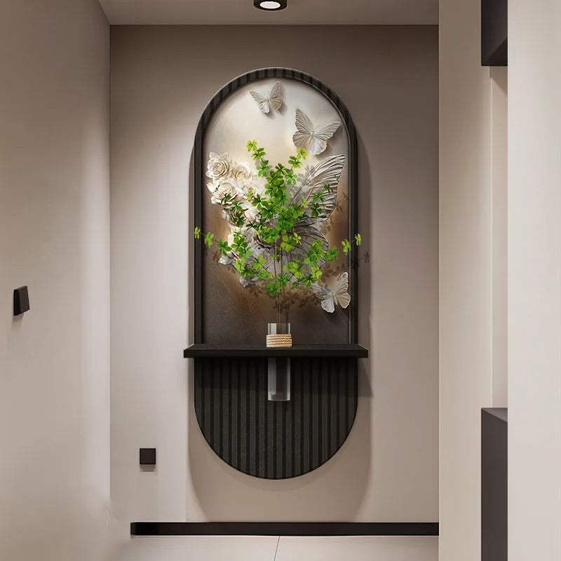 Green Plant Wall Lamp with an arched black ribbed frame, clear glass shade, and green foliage with white flowers and butterflies