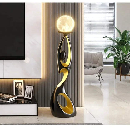 Resin floor lamp sculpture with a black and gold flowing abstract form and a glowing spherical LED shade, Home Decoration Resin Sculpture
