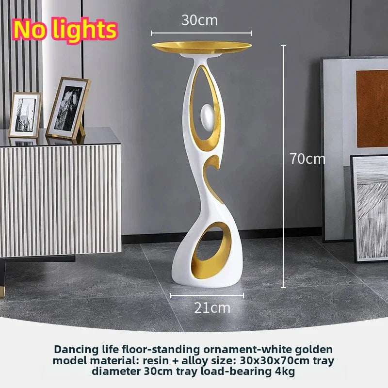 Home Decoration Resin Sculpture in a white and gold resin finish, with a sculptural looped base and shallow round top tray.