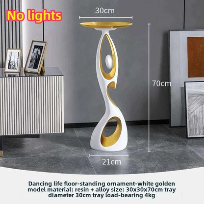 Home Decoration Resin Sculpture in a white and gold resin finish, with a sculptural looped base and shallow round top tray.