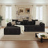 L Shaped Sectional Sofa in black corduroy, featuring a chaise lounge and coordinating throw pillows