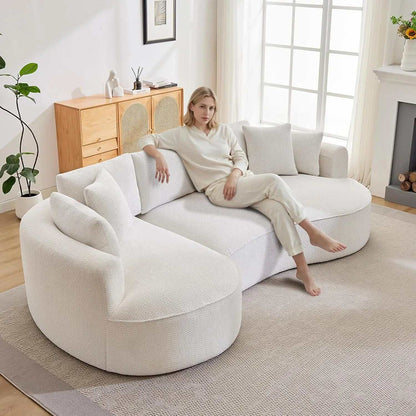 L Shaped Sectional Sofa in white textured upholstery, with rounded modular sections and matching cushions