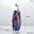 Nordic Style Abstract resin figurine with a glossy purple, pink, blue and magenta geometric design and silver loop top.