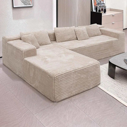Oversized Deep Seat modular sectional sofa in beige corduroy, featuring ribbed upholstery, a wide chaise and low cushioned back