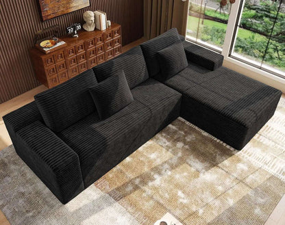 Oversized Deep Seat L-shaped modular sofa in black ribbed corduroy, with deep cushions and a wide chaise.
