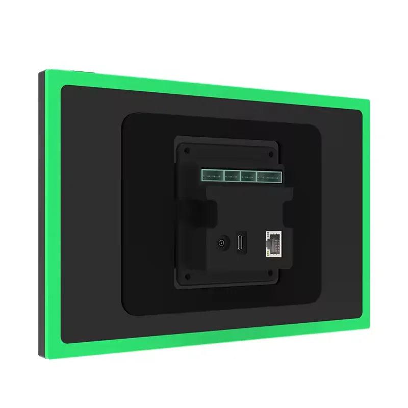 Proximity Sensing Android POE Tablet wall panel with a black glass face, vivid green trim and recessed rear ports.